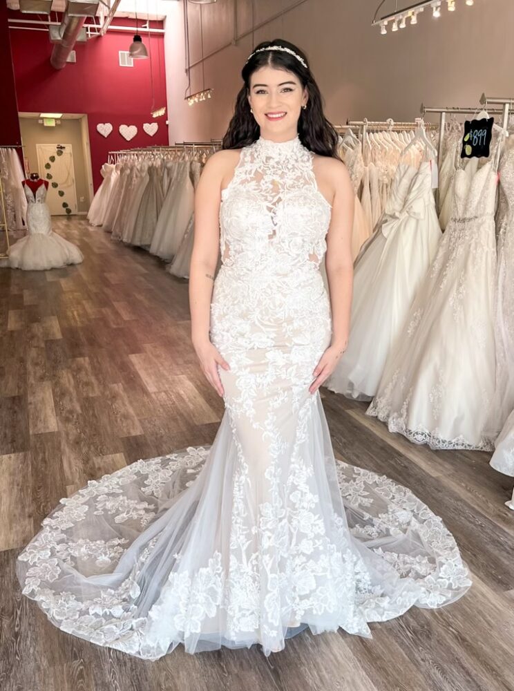 bride wearing high neck lace destination wedding dress in hayward california bridal shop