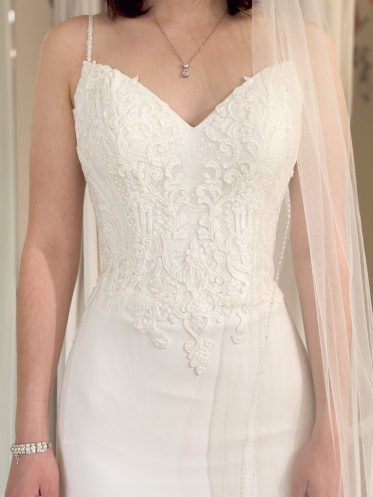 basque waist lace and crepe sheath wedding dress in whittier california bridal store