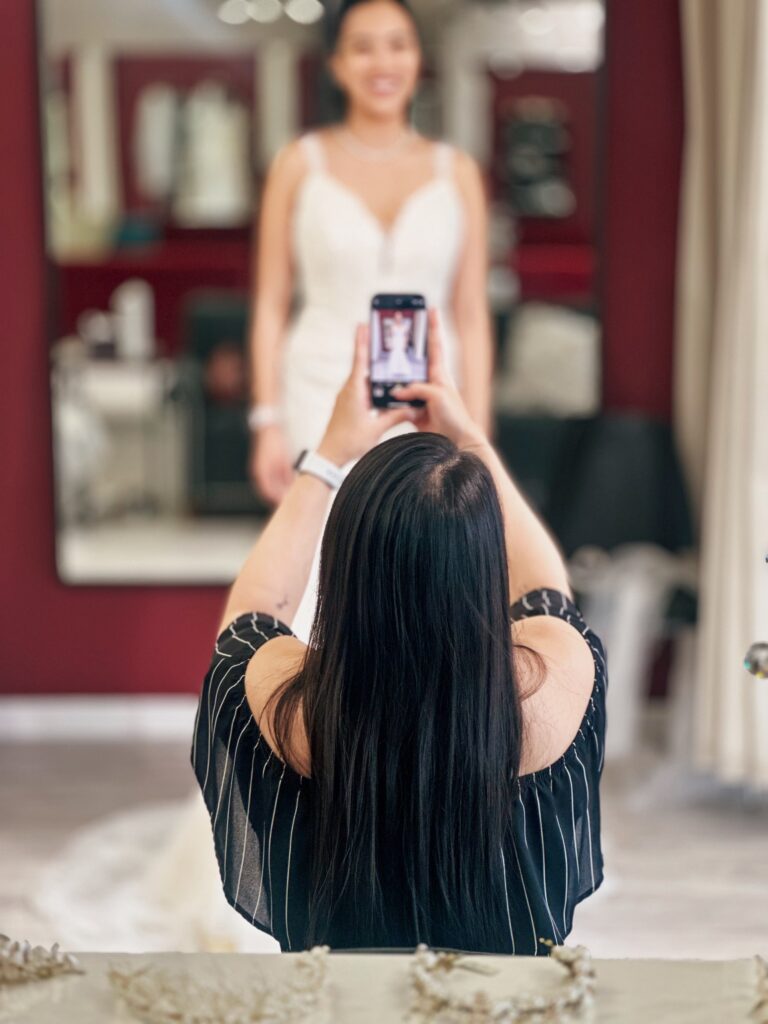 bride trying on wedding dresses in whittier california bridal store